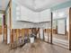 This kitchen is undergoing renovations but features new white cabinets and tile backsplash at 3031 56Th S St, Gulfport, FL 33707