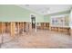 Large living space with hardwood floors, exposed framing and abundant natural light at 3031 56Th S St, Gulfport, FL 33707