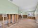Expansive living room with hardwood floors, exposed framing, and ample space for customization at 3031 56Th S St, Gulfport, FL 33707