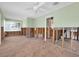 Spacious living room with hardwood floors and open layout, perfect for renovation and customization at 3031 56Th S St, Gulfport, FL 33707