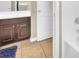 Bathroom showcasing a dark vanity with a white countertop and a tiled floor at 311 Parsons Woods Dr, Seffner, FL 33584