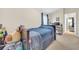 Comfortable bedroom with carpet and natural lighting at 311 Parsons Woods Dr, Seffner, FL 33584