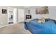 Bedroom featuring carpet and a door leading to a bathroom and a closet at 311 Parsons Woods Dr, Seffner, FL 33584