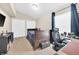 Inviting bedroom with large window, carpet flooring, and ample closet space at 311 Parsons Woods Dr, Seffner, FL 33584
