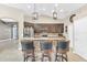 Modern kitchen with stainless steel appliances and a bar with seating at 311 Parsons Woods Dr, Seffner, FL 33584