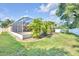 Enclosed screened patio area features ample space for outdoor entertaining while providing shade and protection from the elements at 311 Parsons Woods Dr, Seffner, FL 33584
