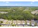 This home is part of a neighborhood surrounded by woodland and a small body of water at 31105 Whitlock Dr, Wesley Chapel, FL 33543