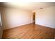 Spacious bedroom featuring hardwood floors, neutral walls, and a bright, airy atmosphere at 3276 38Th S Way # D, St Petersburg, FL 33711