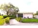 Well maintained clubhouse surrounded by lush landscaping creates a welcoming atmosphere for social gatherings at 3276 38Th S Way # D, St Petersburg, FL 33711
