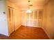 Dining room with hardwood floors, and ample closet space providing functional storage solutions at 3276 38Th S Way # D, St Petersburg, FL 33711