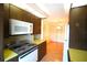 Functional kitchen with ample cabinets, stainless steel appliances and good natural light at 3276 38Th S Way # D, St Petersburg, FL 33711