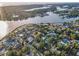 High-angle aerial view of the neighborhood, highlighting the waterfront location and community layout at 330 Pineapple St, Tarpon Springs, FL 34689
