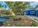 Backyard features landscaping and wooden deck at 330 Pineapple St, Tarpon Springs, FL 34689