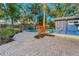 Backyard featuring patio, pool, landscaping and patio furniture at 330 Pineapple St, Tarpon Springs, FL 34689