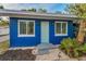 Exterior of blue building showing front door and windows at 330 Pineapple St, Tarpon Springs, FL 34689