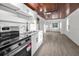 Bright kitchen with stainless steel range and cabinets at 330 Pineapple St, Tarpon Springs, FL 34689