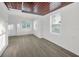 Bright living room with hardwood floors at 330 Pineapple St, Tarpon Springs, FL 34689
