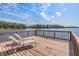 Lakeside community dock with lounge chairs; the perfect place to watch the sunset at 3429 Heards Ferry Dr, Tampa, FL 33618