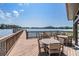 Community dock with seating and lake views from the covered pavilion at Lakeside Preserve at 3429 Heards Ferry Dr, Tampa, FL 33618