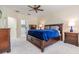 Spacious main bedroom features a ceiling fan, soft carpet, and neutral paint at 3429 Heards Ferry Dr, Tampa, FL 33618