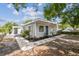 Charming home with a well-maintained exterior and inviting landscape, enhancing its curb appeal at 3838 29Th N St, St Petersburg, FL 33714