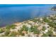 Breathtaking aerial view of waterfront homes with private docks on peaceful waters at 420 Hanby St, Crystal Beach, FL 34681