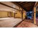 Covered outdoor space with a brick paver patio, offering ample space for entertainment and relaxation at 420 Hanby St, Crystal Beach, FL 34681