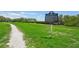 Scenic Gulf Shore Park path amidst lush greenery, ideal for relaxing walks and enjoying nature at 420 Hanby St, Crystal Beach, FL 34681