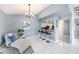 Comfortable living area with tile flooring, seating, and an open view to the kitchen at 4270 Boston Cir, New Port Richey, FL 34653