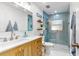 Modern bathroom featuring a glass-enclosed shower, stylish vanity, and contemporary finishes at 50 154Th Ave, Madeira Beach, FL 33708