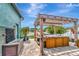 Backyard featuring a luxurious hot tub and custom pergola for ultimate relaxation and entertainment at 5103 Rushbrook Rd, Land O Lakes, FL 34638