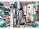 Walk-in closet with ample storage space for clothes, shoes and personal items at 5103 Rushbrook Rd, Land O Lakes, FL 34638