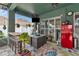 Relaxing patio with bar seating, a vintage refrigerator, and outdoor living at 5103 Rushbrook Rd, Land O Lakes, FL 34638