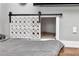 Dog bed in built-in cabinet with decorative sliding doors at 5103 Rushbrook Rd, Land O Lakes, FL 34638