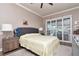 Cozy bedroom with natural light and a private view of the backyard at 5103 Rushbrook Rd, Land O Lakes, FL 34638