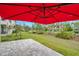 Expansive backyard and common area featuring well manicured lawn at 5103 San Martino Dr, Wesley Chapel, FL 33543
