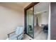 Relaxing balcony looking to the Primary bedroom at 5103 San Martino Dr, Wesley Chapel, FL 33543