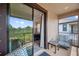 Relaxing balcony with a view of the bedroom and serene outdoors at 5103 San Martino Dr, Wesley Chapel, FL 33543