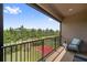 Comfortable outdoor seating area with a view of lush landscaping at 5103 San Martino Dr, Wesley Chapel, FL 33543
