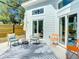 Cozy patio area with outdoor furniture and a grill, perfect for relaxing and entertaining at 5111 28Th N Ave, St Petersburg, FL 33710