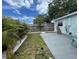 Backyard featuring beautiful palm trees and a fence at 5111 28Th N Ave, St Petersburg, FL 33710