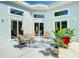 Outdoor living space with furniture, umbrella, and stainless steel grill at 5111 28Th N Ave, St Petersburg, FL 33710