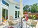 Outdoor living space with furniture, umbrella, and stainless steel grill at 5111 28Th N Ave, St Petersburg, FL 33710