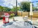 Cozy patio area with outdoor furniture and a grill, perfect for relaxing and entertaining at 5111 28Th N Ave, St Petersburg, FL 33710
