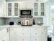 Kitchen counter with stainless appliances and white cabinets at 5111 28Th N Ave, St Petersburg, FL 33710