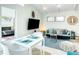 Bright living room and dining area featuring sleek furniture and modern decor at 5111 28Th N Ave, St Petersburg, FL 33710