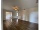 Open concept living room with hardwood floors and ceiling fan at 5111 28Th N Ave, St Petersburg, FL 33710