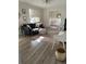 Cozy living room featuring hardwood floors, and a comfortable sectional sofa at 5111 28Th N Ave, St Petersburg, FL 33710