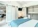 Comfortable bedroom featuring a TV and closet with stylish sliding doors at 5111 28Th N Ave, St Petersburg, FL 33710