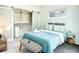Bright main bedroom with a view to walk-in closet and modern furnishings at 5111 28Th N Ave, St Petersburg, FL 33710